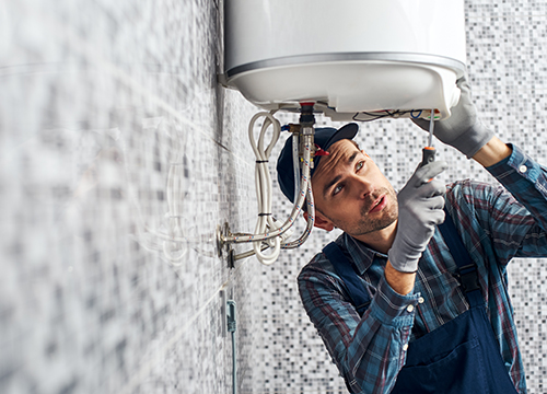 Man fixing Water heater